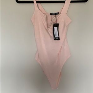 Brand new bodysuit